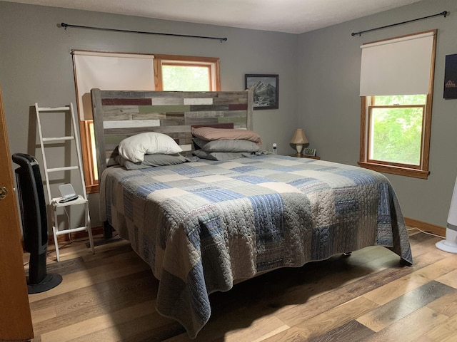 382 Knoll View Rd, Mount Clare, WV 26408 - bedroom with wood finished floors and baseboards