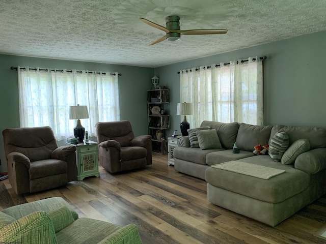 382 Knoll View Rd, Mount Clare, WV 26408 - living room with a textured ceiling, a ceiling fan, and wood finished floors