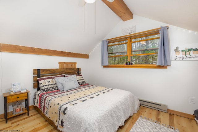 247 Daylily Ct, Terra Alta, WV 26764 - bedroom with a baseboard radiator, wood finished floors, a ceiling fan, and baseboards