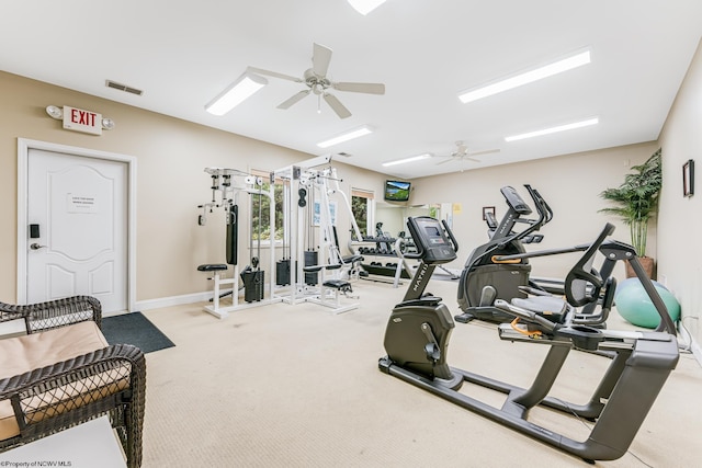 workout area with ceiling fan, carpet flooring, and baseboards