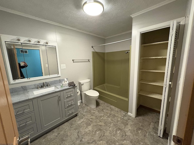 bathroom featuring ornamental molding, a textured ceiling, vanity, toilet, and shower / bath combination