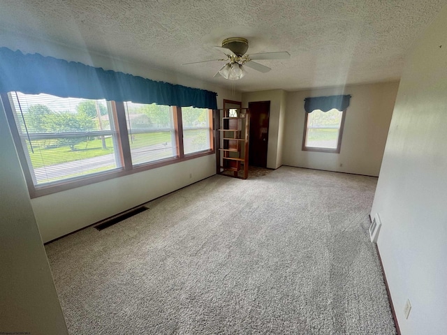 213 Albright Rd, Kingwood, WV 26537 - carpeted spare room featuring a textured ceiling and a ceiling fan