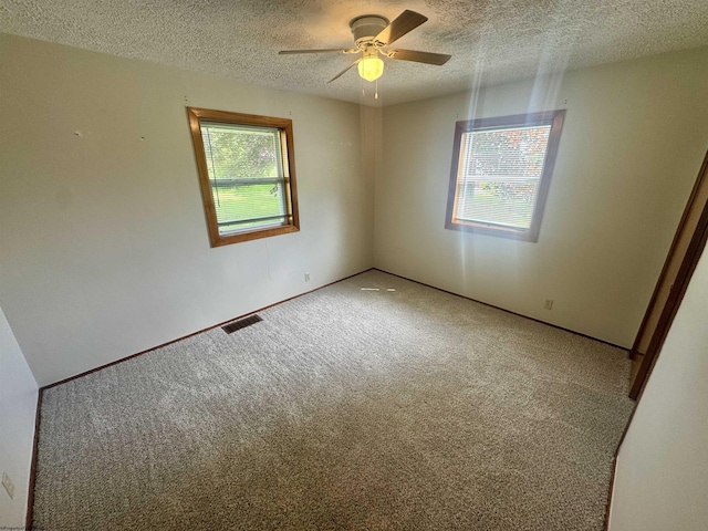 213 Albright Rd, Kingwood, WV 26537 - carpeted empty room featuring a textured ceiling and a ceiling fan