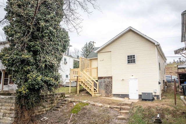 406 Maple Ave, Fairmont, WV 26554 - rear view of house featuring stairway, central AC, and a wooden deck
