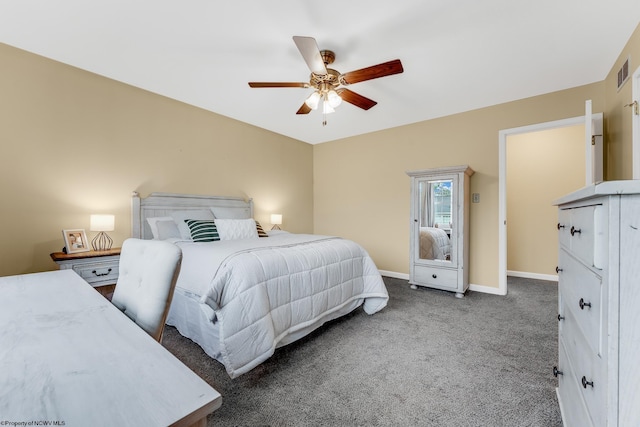 carpeted bedroom with baseboards and a ceiling fan