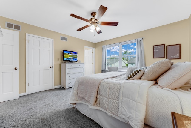 bedroom with carpet floors, baseboards, and a ceiling fan