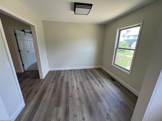 107 Valley Ct, Elkins, WV 26241 - unfurnished room featuring wood finished floors and baseboards