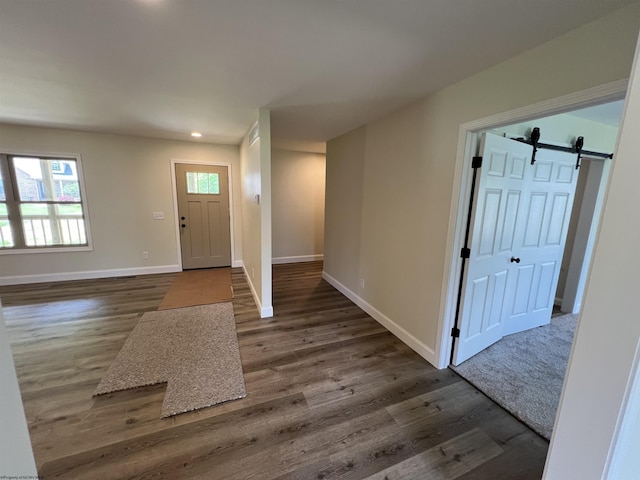 107 Valley Ct, Elkins, WV 26241 - foyer entrance featuring a barn door, dark wood-type flooring, baseboards, and recessed lighting