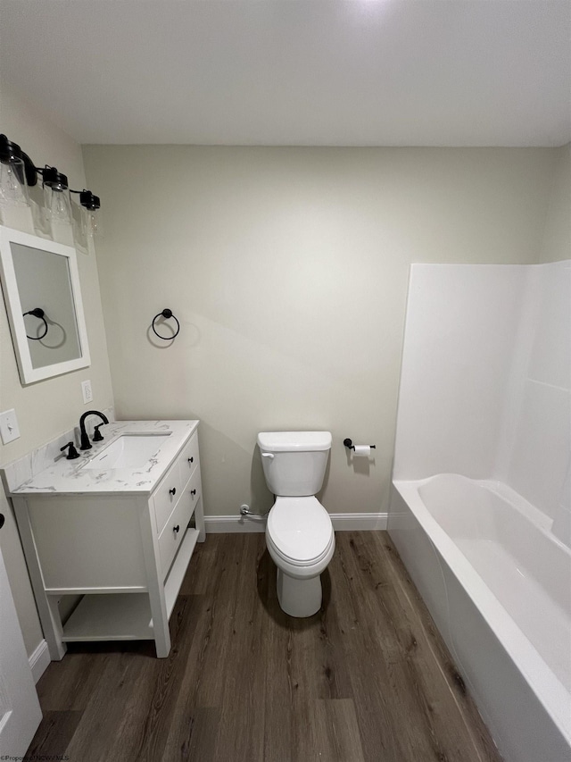 107 Valley Ct, Elkins, WV 26241 - full bath featuring wood finished floors, toilet, vanity, and baseboards