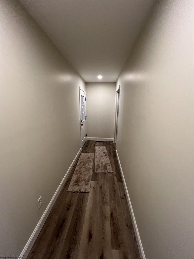 107 Valley Ct, Elkins, WV 26241 - hallway with dark wood-style floors and baseboards