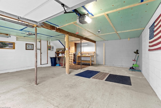 107 Orchard St, Masontown, WV 26542 - garage with a garage door opener and concrete block wall