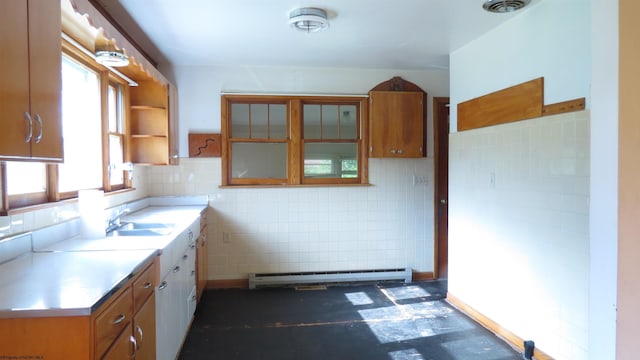 1782 Parsons Rd, Montrose, WV 26283 - kitchen featuring baseboard heating, a sink, light countertops, brown cabinetry, and open shelves