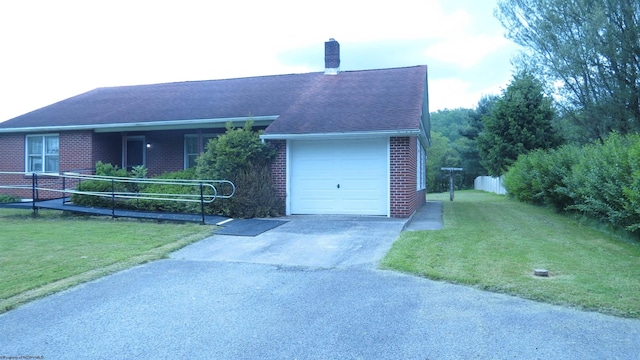 1782 Parsons Rd, Montrose, WV 26283 - ranch-style house with asphalt driveway, brick siding, a garage, a front lawn, and a shingled roof