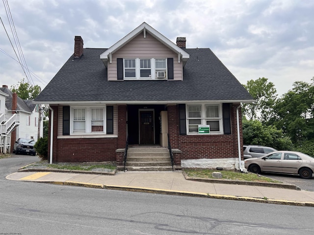 374 Forest Ave Unit 3, Morgantown, WV 26505 - bungalow-style house featuring a chimney, brick siding, and roof with shingles