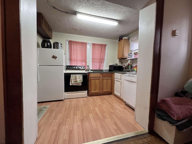 374 Forest Ave Unit 3, Morgantown, WV 26505 - kitchen featuring white appliances, light wood finished floors, a textured ceiling, and dark countertops