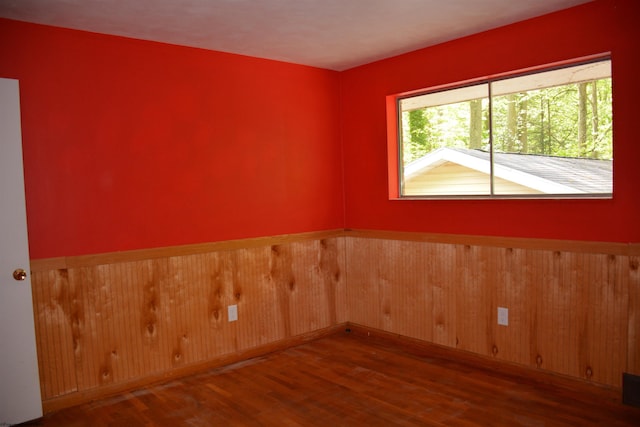1251 Briercliff Rd, Bridgeport, WV 26330 - spare room featuring wood finished floors, wainscoting, and wood walls