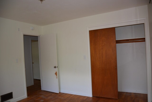 1251 Briercliff Rd, Bridgeport, WV 26330 - unfurnished bedroom featuring wood finished floors, a closet, and baseboards
