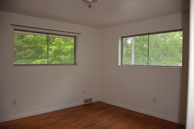 1251 Briercliff Rd, Bridgeport, WV 26330 - empty room with plenty of natural light, baseboards, and wood finished floors