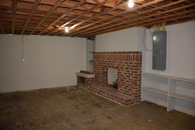1251 Briercliff Rd, Bridgeport, WV 26330 - basement featuring electric panel, a brick fireplace, and concrete block wall