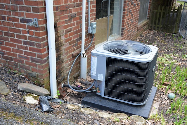 1251 Briercliff Rd, Bridgeport, WV 26330 - exterior view of central AC and brick siding