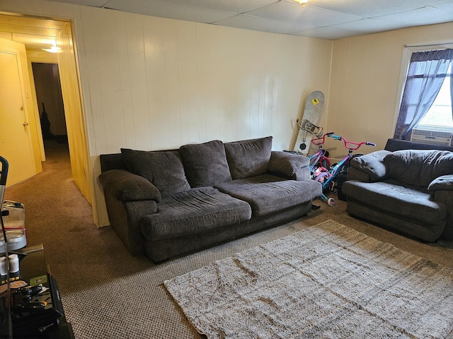carpeted living area with cooling unit