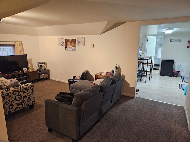 carpeted living room with baseboards