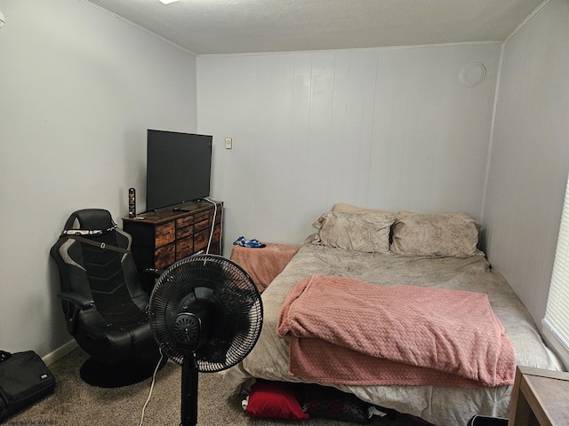 carpeted bedroom with crown molding