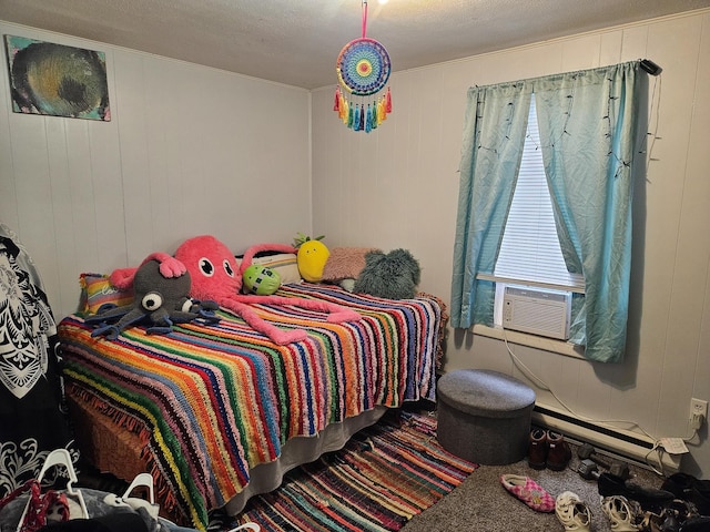 bedroom featuring cooling unit and wooden walls