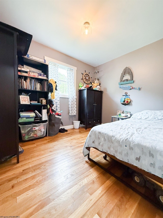 96 Long St, Hambleton, WV 26269 - bedroom with wood finished floors and baseboards
