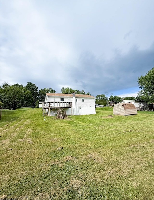 96 Long St, Hambleton, WV 26269 - view of green lawn featuring a wooden deck, a shed, an outbuilding, and stairs