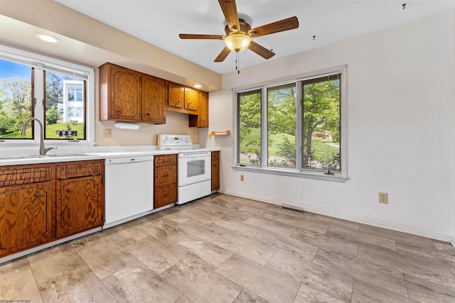 6 Ridge Pl, Morgantown, WV 26505 - kitchen featuring white appliances, a sink, brown cabinets, light countertops, and ceiling fan