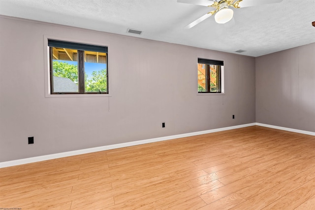 6 Ridge Pl, Morgantown, WV 26505 - unfurnished room featuring light wood-style flooring, ceiling fan, baseboards, and a textured ceiling