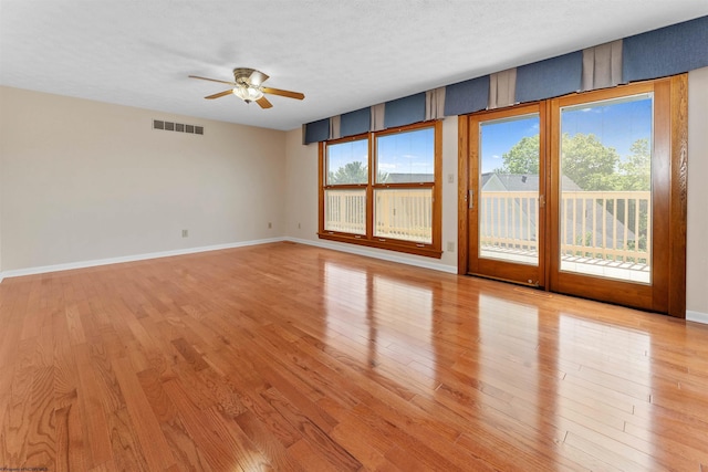 6 Ridge Pl, Morgantown, WV 26505 - empty room featuring a ceiling fan, light wood-style flooring, baseboards, and a textured ceiling