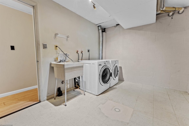 6 Ridge Pl, Morgantown, WV 26505 - clothes washing area featuring washer and clothes dryer, tile patterned floors, and a sink