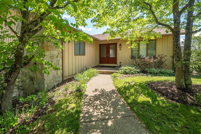 6 Ridge Pl, Morgantown, WV 26505 - view of exterior entry featuring french doors and board and batten siding