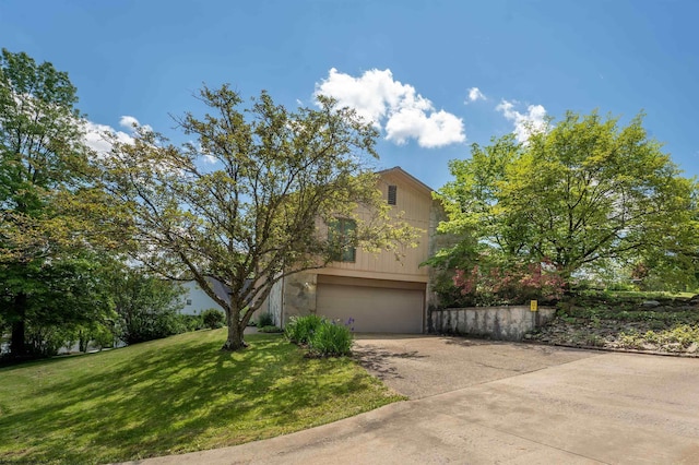6 Ridge Pl, Morgantown, WV 26505 - obstructed view of property featuring driveway, stone siding, a front yard, and an attached garage