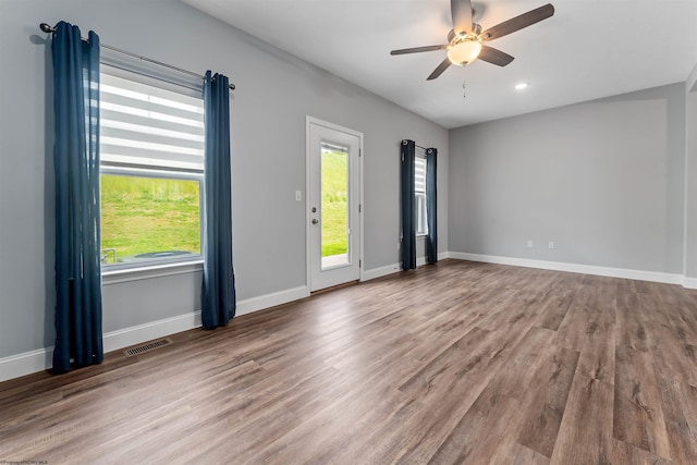 2052 Mountain Ash Ln, Morgantown, WV 26501 - empty room with wood finished floors, ceiling fan, baseboards, and recessed lighting