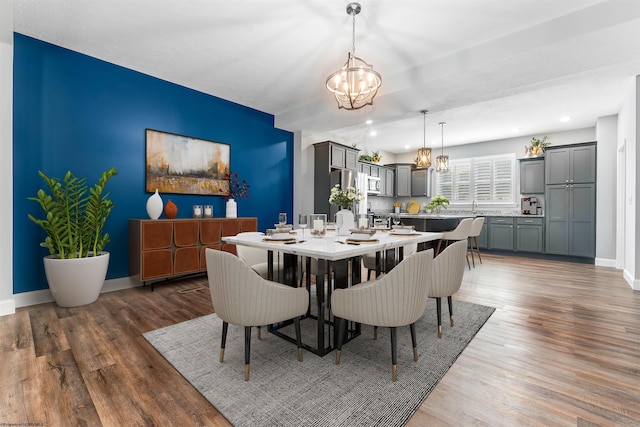 2052 Mountain Ash Ln, Morgantown, WV 26501 - dining space featuring a chandelier, wood finished floors, baseboards, and recessed lighting