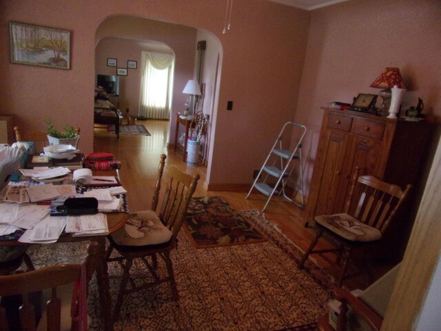 201 Findley St, Elkins, WV 26241 - dining space featuring arched walkways and wood finished floors