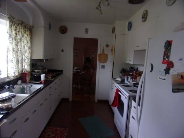 201 Findley St, Elkins, WV 26241 - kitchen featuring white appliances, white cabinets, a sink, and dark wood finished floors