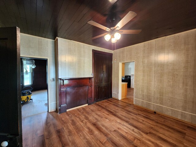580 Deer Haven Dr, Lost Creek, WV 26385 - unfurnished bedroom featuring wood finished floors, wood ceiling, baseboards, and a ceiling fan