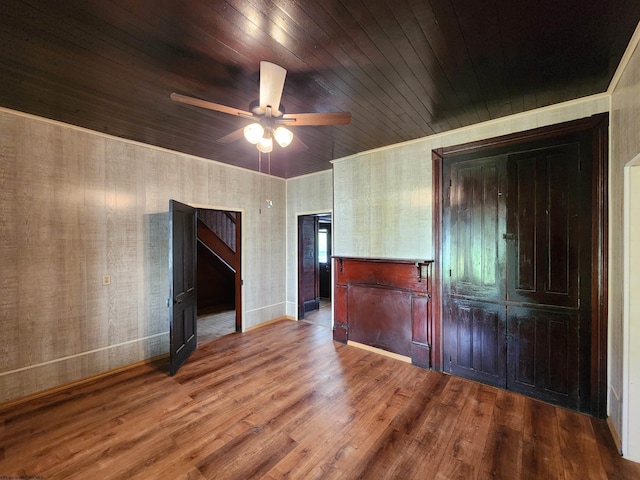 580 Deer Haven Dr, Lost Creek, WV 26385 - unfurnished room featuring ceiling fan, wood finished floors, baseboards, and wooden ceiling