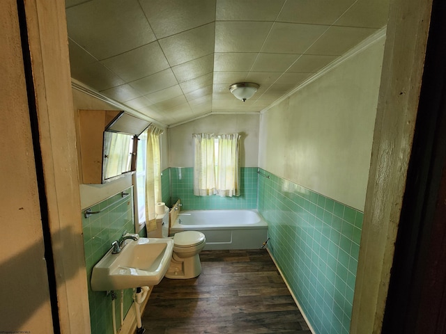 580 Deer Haven Dr, Lost Creek, WV 26385 - full bath with tile walls, a sink, a tub to relax in, ornamental molding, and wainscoting