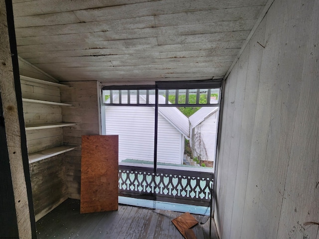 580 Deer Haven Dr, Lost Creek, WV 26385 - interior space featuring lofted ceiling, wood walls, and wood-type flooring