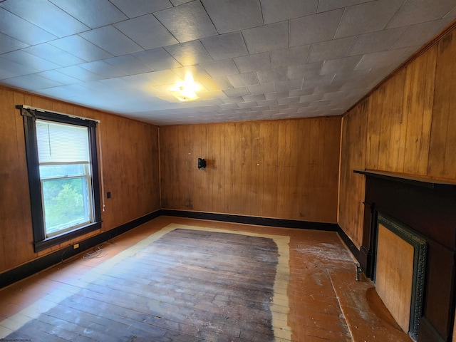 580 Deer Haven Dr, Lost Creek, WV 26385 - unfurnished living room featuring a fireplace and wooden walls