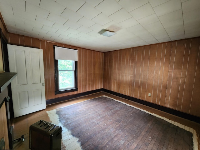580 Deer Haven Dr, Lost Creek, WV 26385 - empty room featuring wood-type flooring and wooden walls
