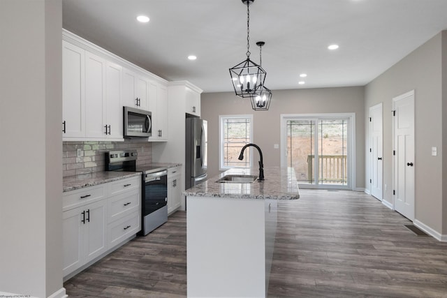 111 Frisco Ln, Bridgeport, WV 26330 - kitchen featuring appliances with stainless steel finishes, a sink, dark wood-type flooring, an island with sink, and recessed lighting