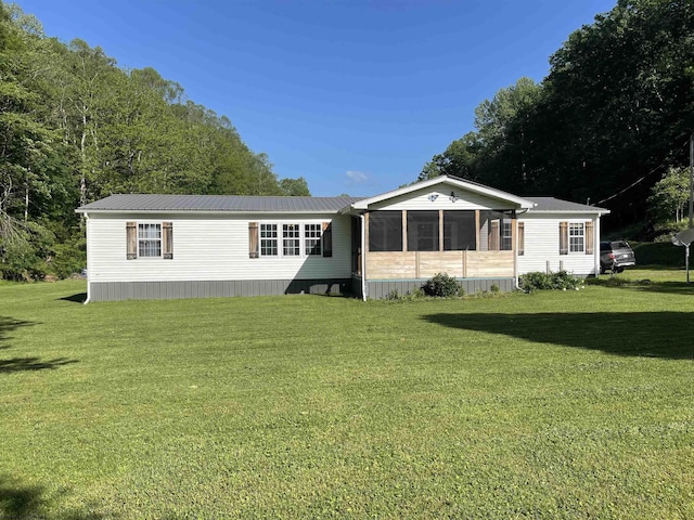 564 Big Run Rd, Napier, WV 26631 - back of property with a sunroom, a yard, and metal roof