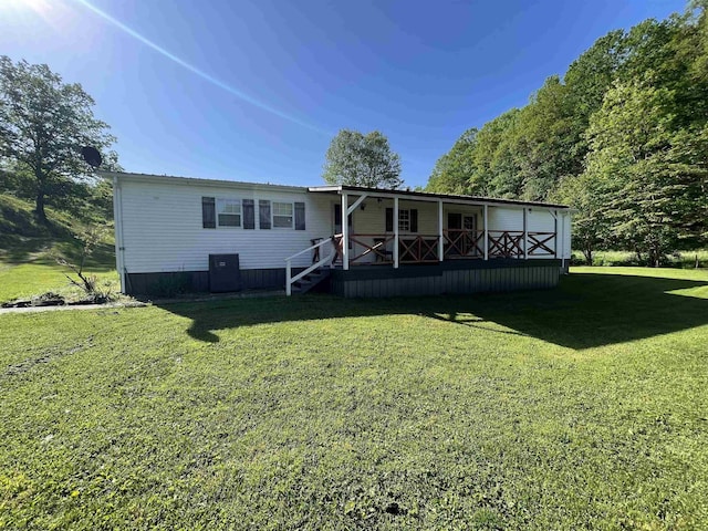 564 Big Run Rd, Napier, WV 26631 - back of house with a lawn and covered porch
