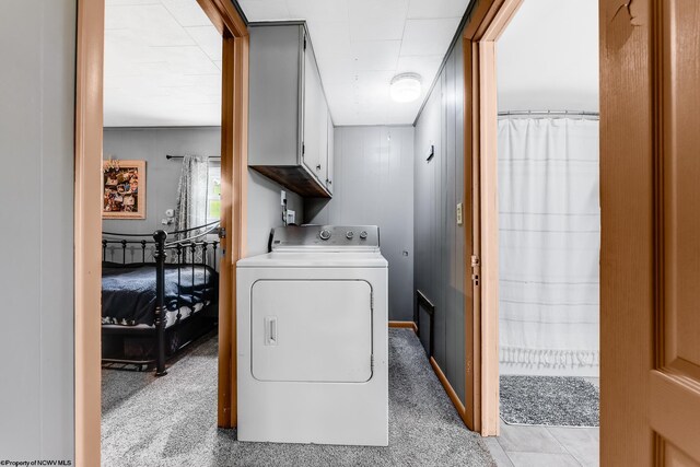 719 Elk Run Rd, Bruceton Mills, WV 26525 - laundry area with washer / dryer and cabinet space